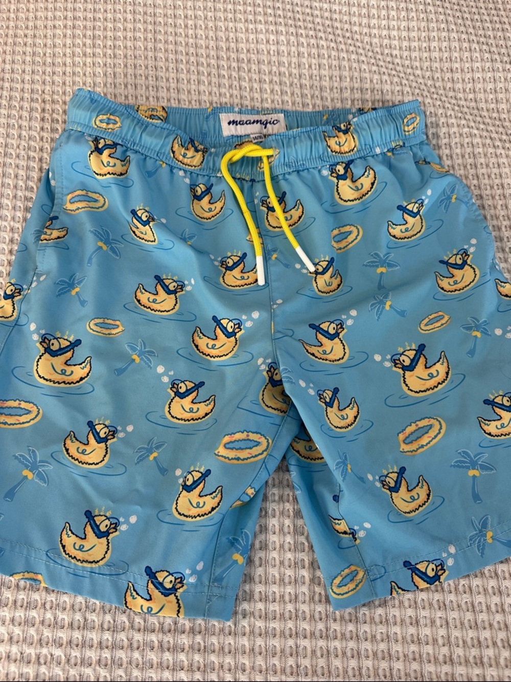 Brand new! Boys' Light Blue Swim Trunks with Yellow Duck Print